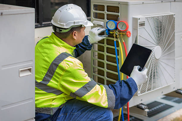 Professional Air Conditioning Repair technician working in Manakin Sabot, VA